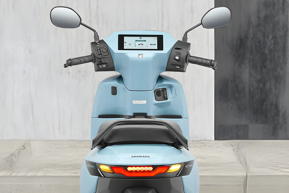 Petrol hassles are over! The Honda Activa Electric 2026 offers a 102km range, 80km/h top speed, and a smart TFT display.